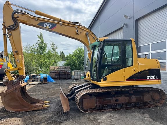 Cat 312CL. Vi tar innbytte.